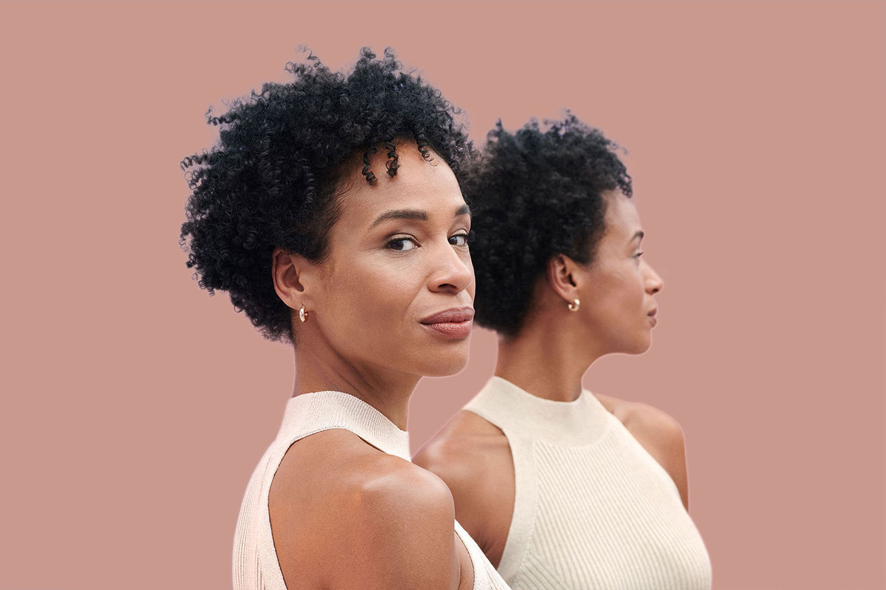 Image of woman looking over her shoulder